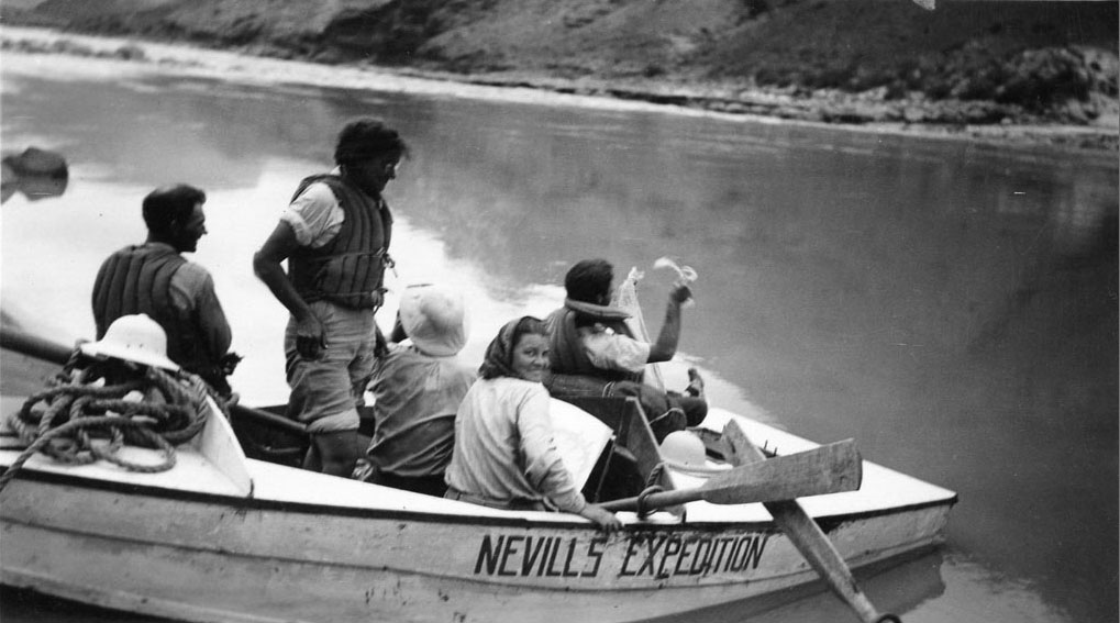 Professor Elzada Clover, standing, and her graduate assistant, Lois Jotter, launch with the Nevills Expedition.