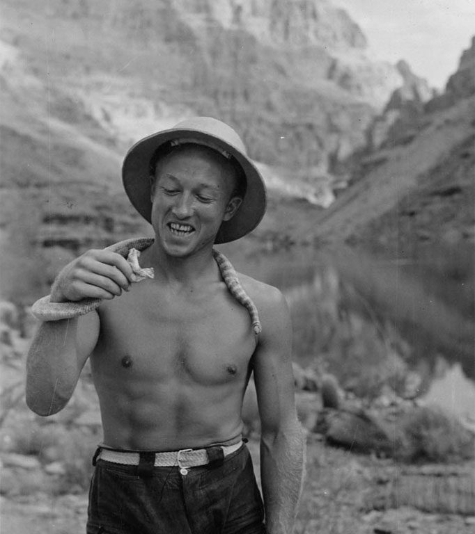 Lorin Bell, who joined the expedition at its layover at Lee’s Ferry, with rattlesnake he captured at Quartermaster Canyon.